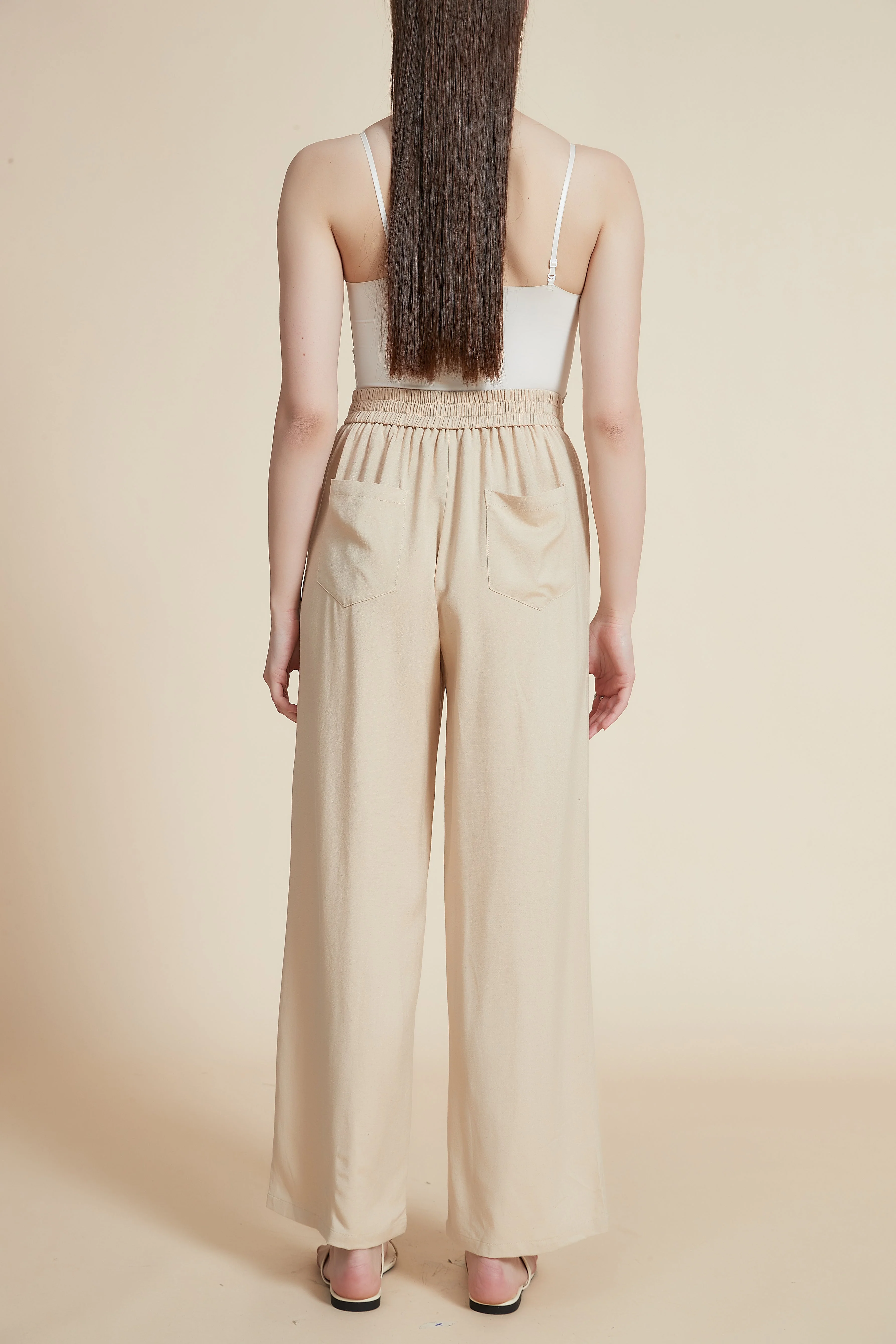 Long pants with wide cut pockets - Image 3